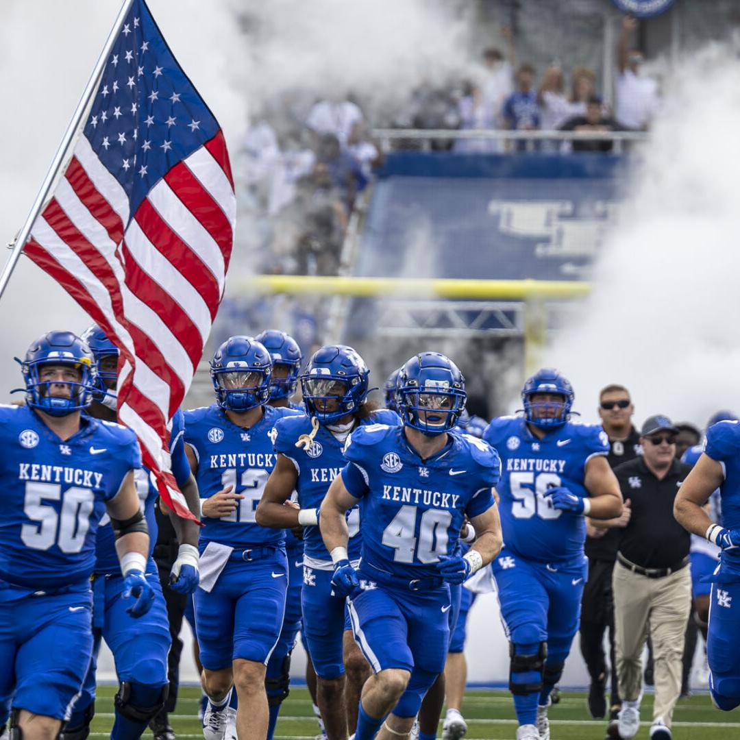 Kentucky football runs onto field
